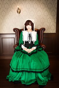 Rating: Safe Score: 0 Tags: 1girl brown_hair chair dress frills green_dress green_eyes long_hair long_sleeves sitting solo suiseiseki User: admin