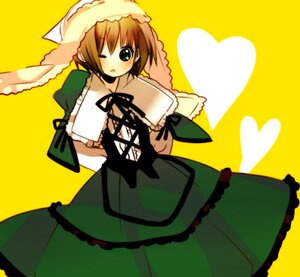 Rating: Safe Score: 0 Tags: 1girl brown_hair dress frills green_dress green_eyes heart image looking_at_viewer one_eye_closed puffy_sleeves ribbon simple_background solo suiseiseki yellow_background User: admin