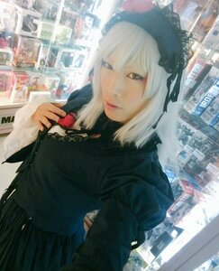 Rating: Safe Score: 0 Tags: 1girl 3d black_dress building city closed_mouth dress gothic_lolita long_sleeves looking_at_viewer photo solo suigintou white_hair User: admin