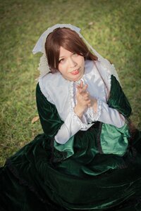 Rating: Safe Score: 0 Tags: 1girl brown_eyes brown_hair dress frills green_dress lips long_hair long_sleeves looking_at_viewer outdoors smile solo suiseiseki User: admin