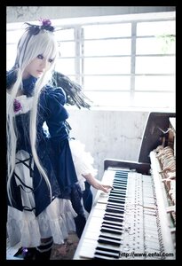 Rating: Safe Score: 0 Tags: 1girl blue_eyes dress flower frills hair_ornament instrument letterboxed long_hair music piano pillarboxed playing_instrument rose sheet_music silver_hair sitting solo suigintou very_long_hair window wings User: admin