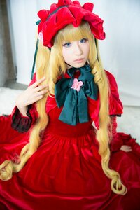 Rating: Safe Score: 0 Tags: 1girl bangs blonde_hair blue_eyes bonnet bow dress flower lips long_hair long_sleeves looking_at_viewer red_dress shinku sitting solo very_long_hair User: admin