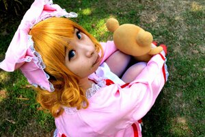Rating: Safe Score: 0 Tags: 1girl blonde_hair blue_eyes bow doll dress from_above grass hinaichigo looking_up outdoors photo pink_dress realistic sitting solo stuffed_animal teddy_bear User: admin