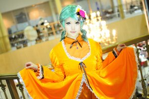 Rating: Safe Score: 0 Tags: 1girl aqua_hair blurry blurry_background depth_of_field dress flower frilled_sleeves frills hair_flower hair_ornament indoors kanaria long_sleeves orange_dress photo skirt_hold smile solo yellow_dress User: admin