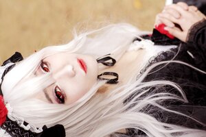 Rating: Safe Score: 0 Tags: 1girl auto_tagged blurry blurry_foreground depth_of_field dress flower frills gothic_lolita hairband holding_hands lips lolita_fashion lolita_hairband long_hair looking_at_viewer photo red_eyes solo suigintou white_hair User: admin
