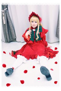 Rating: Safe Score: 0 Tags: 1girl blonde_hair blue_eyes bonnet cup dress flower long_hair long_sleeves petals red_dress rose rose_petals shinku shoes sitting solo striped teacup User: admin