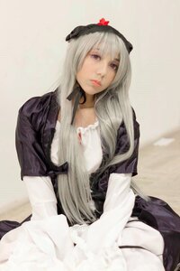 Rating: Safe Score: 0 Tags: 1girl black_dress blurry closed_mouth dress lips long_hair looking_at_viewer silver_hair sitting solo striped suigintou User: admin