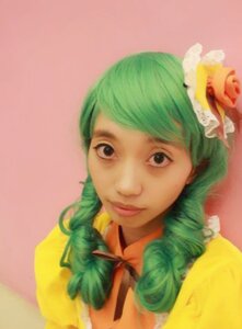 Rating: Safe Score: 0 Tags: 1girl flower green_hair hair_flower hair_ornament kanaria lips looking_at_viewer portrait simple_background solo User: admin