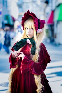 Rating: Safe Score: 0 Tags: 1girl blonde_hair blue_eyes blurry blurry_background blurry_foreground bonnet depth_of_field dress long_hair long_sleeves looking_at_viewer motion_blur outdoors photo shinku solo User: admin