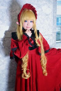 Rating: Safe Score: 0 Tags: 1girl blonde_hair blue_eyes bonnet dress flower long_hair long_sleeves looking_at_viewer red_dress shinku solo very_long_hair User: admin