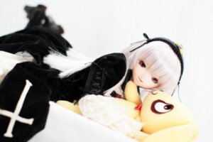 Rating: Safe Score: 0 Tags: 1girl 3d bangs black_dress blurry blurry_background blurry_foreground depth_of_field doll dress frills hairband long_hair long_sleeves looking_at_viewer motion_blur photo red_eyes simple_background solo suigintou wings User: admin