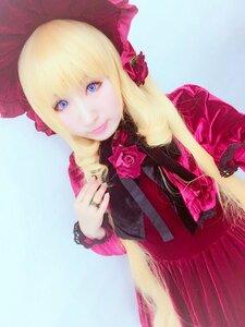 Rating: Safe Score: 0 Tags: 1girl blonde_hair blue_background blue_eyes bonnet dress flower hat jewelry lips long_hair long_sleeves looking_at_viewer pink_flower pink_rose red_dress rose shinku solo upper_body User: admin