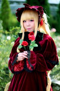 Rating: Safe Score: 0 Tags: 1girl bangs blonde_hair blue_eyes blurry blurry_background bonnet bow depth_of_field dress flower frills garden lips lolita_fashion long_hair long_sleeves outdoors pink_rose red_dress red_flower red_rose rose shinku solo User: admin