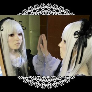 Rating: Safe Score: 0 Tags: 2girls bangs black_ribbon blunt_bangs closed_mouth doll_joints frills gothic_lolita hairband joints letterboxed lolita_fashion long_hair long_sleeves multiple_girls ribbon silver_hair solo suigintou white_hair User: admin