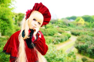 Rating: Safe Score: 0 Tags: 1girl bangs blonde_hair blue_eyes blurry bonnet dress flower long_hair long_sleeves looking_at_viewer outdoors red_dress shinku solo very_long_hair User: admin