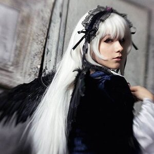 Rating: Safe Score: 0 Tags: 1girl blurry closed_mouth depth_of_field feathers gothic_lolita hairband lolita_hairband long_sleeves looking_at_viewer ribbon silver_hair solo suigintou upper_body wings User: admin