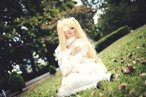 Rating: Safe Score: 0 Tags: 1girl blonde_hair blurry depth_of_field dress flower kirakishou long_hair long_sleeves outdoors sitting solo striped very_long_hair white_dress User: admin