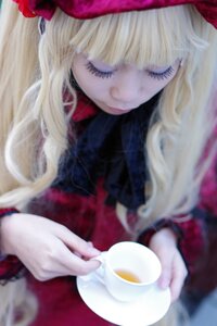 Rating: Safe Score: 0 Tags: 1girl bangs blonde_hair blurry blurry_background blurry_foreground cup depth_of_field flower long_hair saucer shinku smile solo spoon tea teacup User: admin
