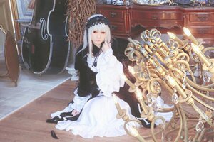 Rating: Safe Score: 0 Tags: 1girl black_dress dress frills hairband indoors long_hair long_sleeves looking_at_viewer red_eyes silver_hair solo suigintou User: admin