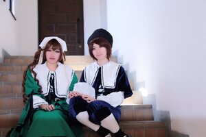 Rating: Safe Score: 0 Tags: 2girls apron bangs blue_eyes brown_hair closed_mouth dress green_dress hat indoors long_sleeves looking_at_viewer multiple_cosplay multiple_girls sisters sitting smile tagme User: admin