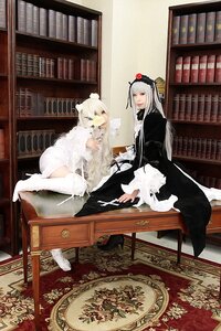 Rating: Safe Score: 0 Tags: 2girls book book_stack bookshelf dress flower gothic_lolita library lolita_fashion long_hair multiple_cosplay multiple_girls sitting tagme too_many white_hair User: admin