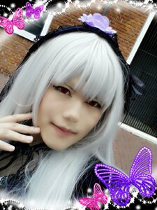 Rating: Safe Score: 0 Tags: 1girl architecture blue_butterfly bug building butterfly butterfly_hair_ornament butterfly_wings face hairband insect lips looking_at_viewer red_eyes smile solo suigintou User: admin