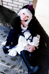 Rating: Safe Score: 0 Tags: 1girl black_dress black_wings closed_eyes dress feathers flower frills gothic_lolita hairband lolita_fashion long_hair long_sleeves sitting solo suigintou wings User: admin