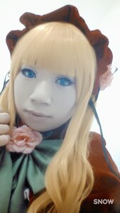 Rating: Safe Score: 0 Tags: 1girl bangs blonde_hair blue_eyes bonnet bow closed_mouth flower lips long_hair looking_at_viewer rose shinku smile solo striped User: admin