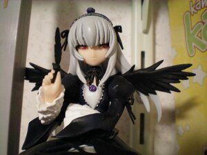 Rating: Safe Score: 0 Tags: 1girl bangs black_wings doll dress feathered_wings feathers frills hairband long_hair long_sleeves looking_at_viewer photo red_eyes ribbon rose silver_hair solo suigintou upper_body wings User: admin