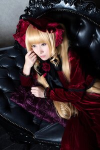 Rating: Safe Score: 0 Tags: 1girl blonde_hair blue_eyes bonnet bow couch dress flower lips lolita_fashion long_hair long_sleeves looking_at_viewer red_dress rose shinku sitting solo User: admin