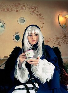 Rating: Safe Score: 0 Tags: 1girl cup dress flower frills gothic_lolita lips lolita_fashion long_hair long_sleeves looking_at_viewer nail_polish purple_eyes saucer sitting solo suigintou tea teacup white_hair User: admin