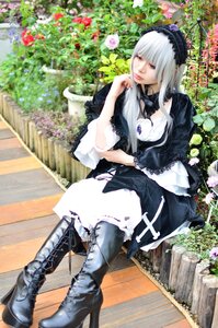 Rating: Safe Score: 0 Tags: 1girl bangs boots cross-laced_footwear dress flower frills gothic_lolita knee_boots lips lolita_fashion long_hair realistic sitting solo suigintou white_hair User: admin
