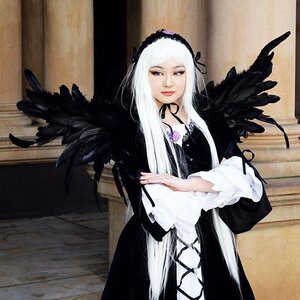 Rating: Safe Score: 0 Tags: 1girl black_ribbon black_wings dress feathered_wings feathers flower gothic_lolita hairband lolita_fashion long_hair long_sleeves looking_at_viewer silver_hair solo suigintou wings User: admin