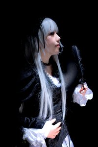 Rating: Safe Score: 0 Tags: 1girl black_background dress lace lips long_hair long_sleeves profile simple_background solo suigintou User: admin