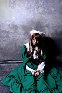 Rating: Safe Score: 0 Tags: 1girl brown_hair dress green_dress long_hair long_sleeves sitting solo suiseiseki User: admin