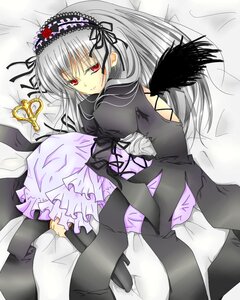 Rating: Safe Score: 0 Tags: 1girl black_wings dress frills hairband image long_hair long_sleeves looking_at_viewer lying red_eyes ribbon rose silver_hair smile solo suigintou wings User: admin