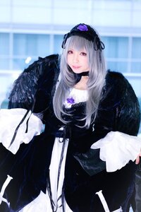 Rating: Safe Score: 0 Tags: 1girl bangs black_dress black_wings dress feathers flower gothic_lolita hairband lips lolita_fashion long_hair long_sleeves looking_at_viewer pink_eyes purple_rose rose silver_hair solo suigintou User: admin