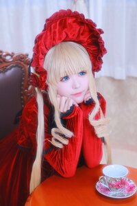 Rating: Safe Score: 0 Tags: 1girl bangs blonde_hair blue_eyes blurry bonnet closed_mouth cup depth_of_field dress flower lips long_hair long_sleeves looking_at_viewer photo red_dress red_flower red_rose rose saucer shinku sitting smile solo table tea teacup User: admin