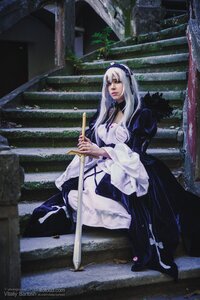 Rating: Safe Score: 0 Tags: 1girl dress forest hairband lips long_hair long_sleeves nature sitting solo suigintou weapon User: admin