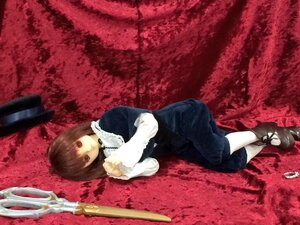 Rating: Safe Score: 0 Tags: 1girl bangs brown_hair doll dress long_sleeves looking_at_viewer lying on_side red_eyes shoes solo souseiseki white_legwear User: admin