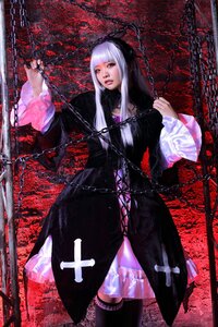 Rating: Safe Score: 0 Tags: 1girl black_dress chain chained dress long_hair red_eyes solo suigintou User: admin