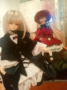 Rating: Safe Score: 0 Tags: 2girls blonde_hair doll dress hat long_sleeves multiple_dolls multiple_girls sitting standing tagme umbrella User: admin