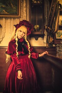 Rating: Safe Score: 0 Tags: 1girl blonde_hair blue_eyes bonnet dress flower indoors long_hair long_sleeves red_dress rose shinku solo traditional_media User: admin