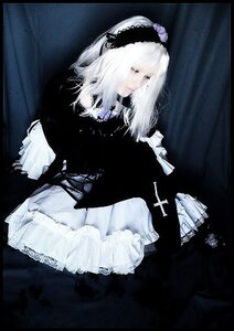 Rating: Safe Score: 0 Tags: 1girl cross dress frills gothic_lolita lolita_fashion long_hair long_sleeves sitting solo suigintou white_hair User: admin