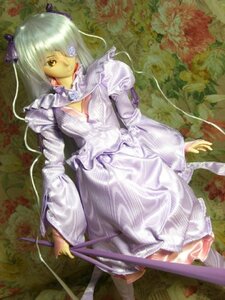 Rating: Safe Score: 0 Tags: 1girl dress eyepatch flower frills long_hair long_sleeves solo yellow_eyes User: admin