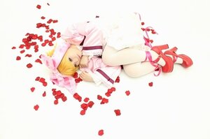 Rating: Safe Score: 0 Tags: 1girl auto_tagged blonde_hair dress flower high_heels hinaichigo lying on_side petals red_footwear ribbon rose_petals shoes solo striped vertical_stripes User: admin