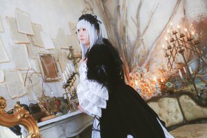 Rating: Safe Score: 0 Tags: 1girl bangs black_dress dress frills hairband indoors long_sleeves red_eyes solo standing suigintou white_hair User: admin