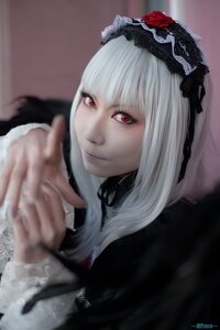 Rating: Safe Score: 0 Tags: 1girl bangs blurry blurry_background blurry_foreground closed_mouth depth_of_field flower gothic_lolita hairband lace lips lolita_fashion long_hair long_sleeves looking_at_viewer red_eyes rose solo suigintou User: admin