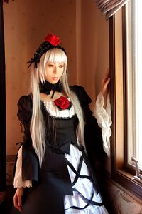 Rating: Safe Score: 0 Tags: 1girl dress flower frills gothic_lolita lips lolita_fashion long_hair long_sleeves looking_at_viewer red_eyes rose solo suigintou white_hair User: admin