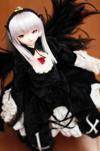 Rating: Safe Score: 0 Tags: 1girl black_dress black_wings blurry blurry_foreground depth_of_field doll dress flower frills hairband long_hair long_sleeves looking_at_viewer red_eyes rose silver_hair sitting solo suigintou very_long_hair wings User: admin